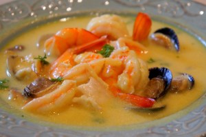 Creamy seafood chowder with a hint of turmeric