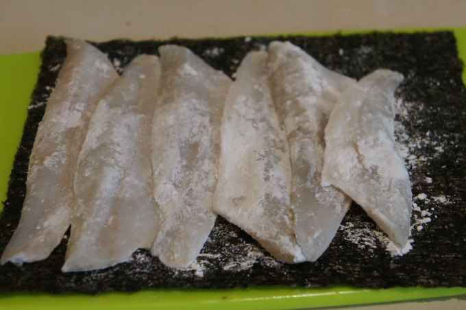 Fresh whiting fillets dusted with rice flour
