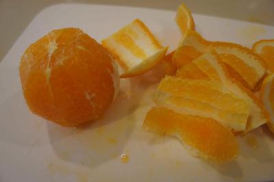 Peeling an orange for sweet & sour pork