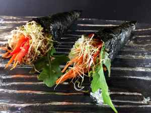 Hand nori rolls of alfalfa, rocket, carrot and sesame seeds. low FODMAP, vegan, gluten free