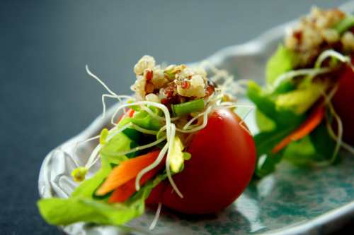 Cherry tomato sandwich with quinoa, coriander and alfalfa