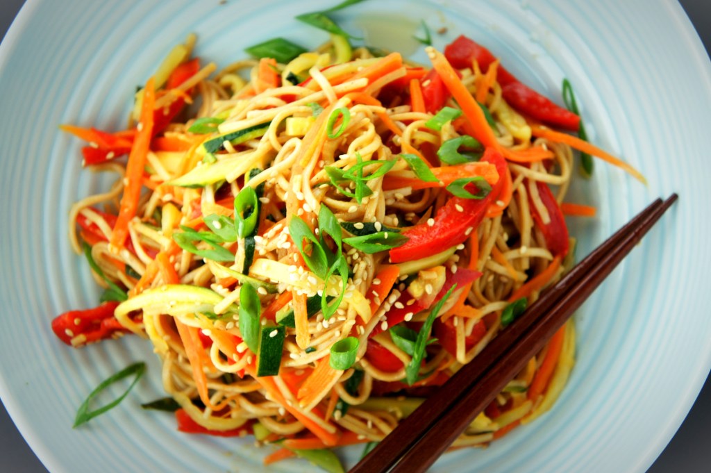 Soba noodles tossed with sautéed vegetables, soy sauce and sesame oil.