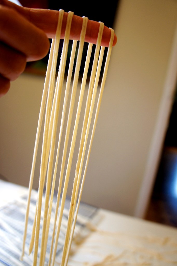 Homemade wheat noodles - rolling out the noodles